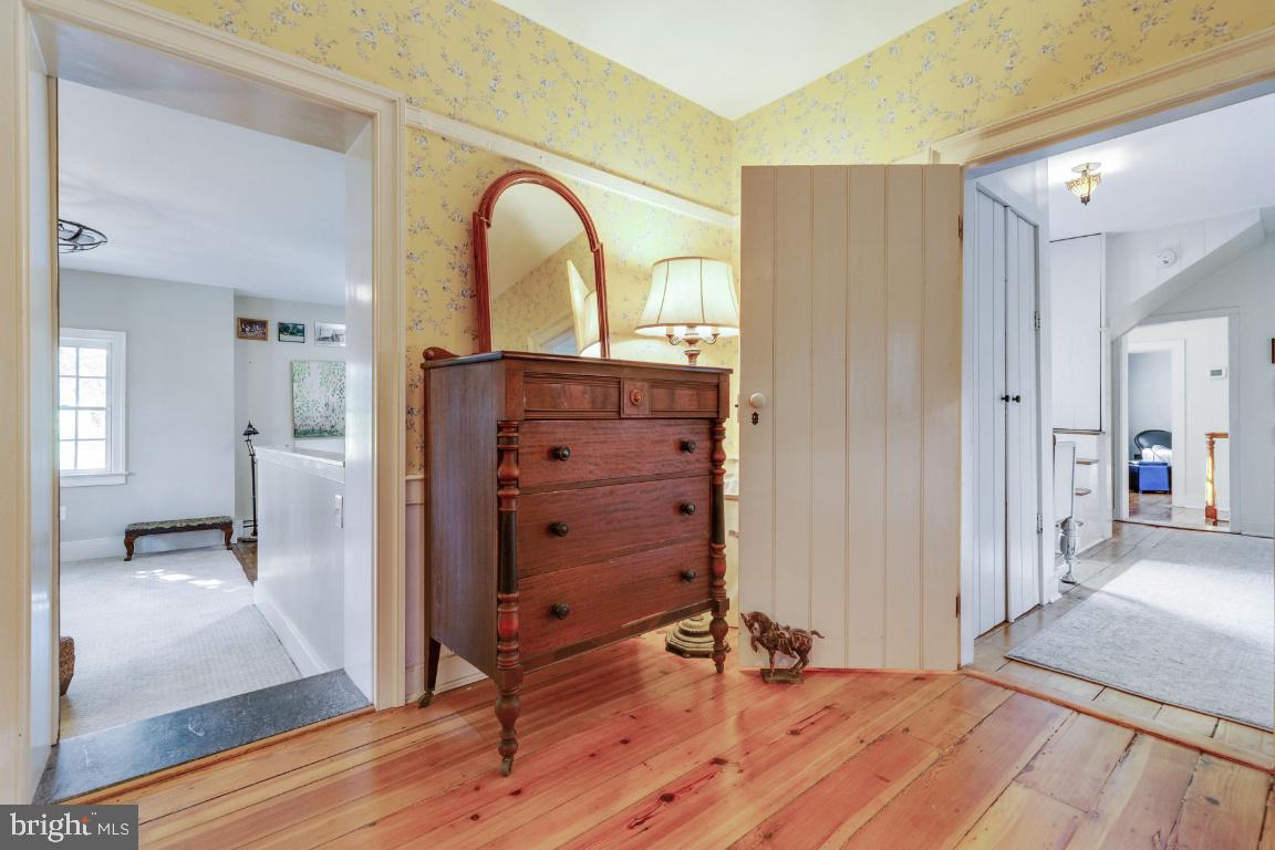 16191 Hamilton Station Road Waterford, VA 20197 - Photo 36 of 94 Primary bedroom with view of hallway