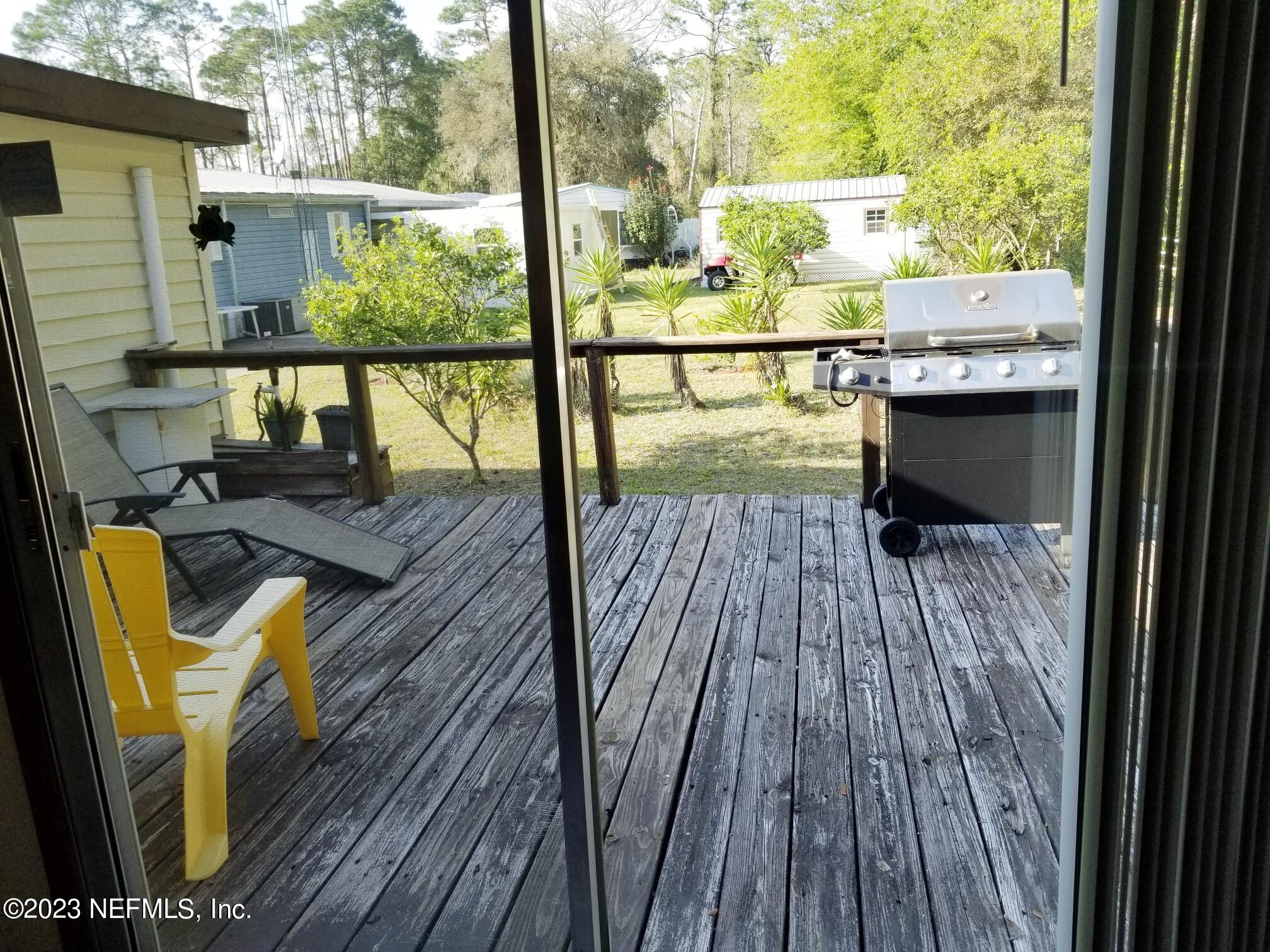 116 Douglas Street Crescent City, FL 32112 - Photo 15 of 26 a view of balcony with wooden floor