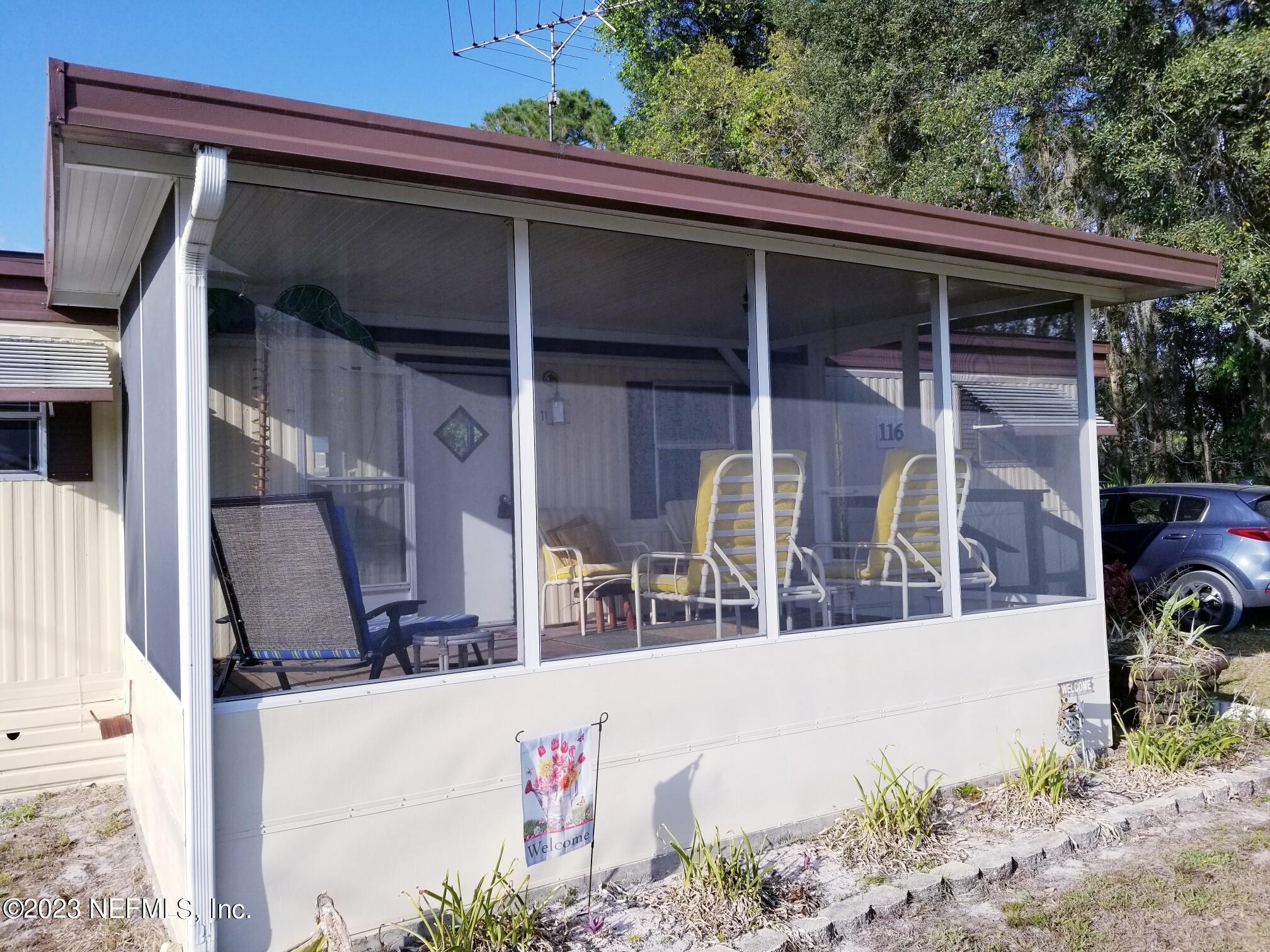 116 Douglas Street Crescent City, FL 32112 - Photo 2 of 26 a view of house with a outdoor space