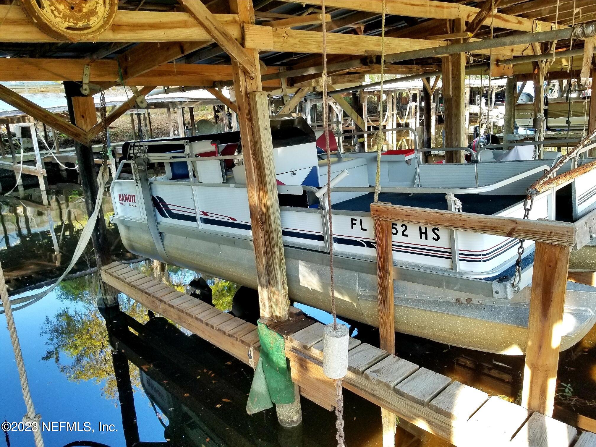 116 Douglas Street Crescent City, FL 32112 - Photo 26 of 26 a view of dinning table and chairs in patio