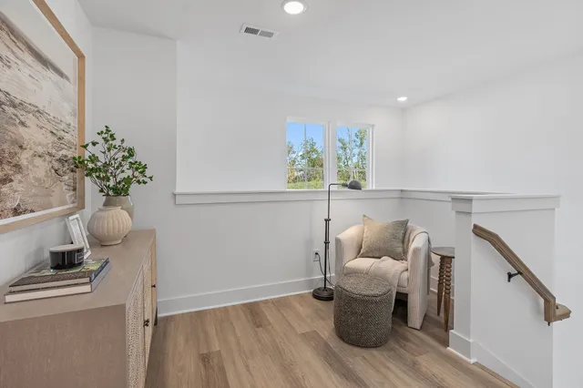 a bed room with a bed and a window