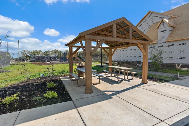 a view of a park with a slide