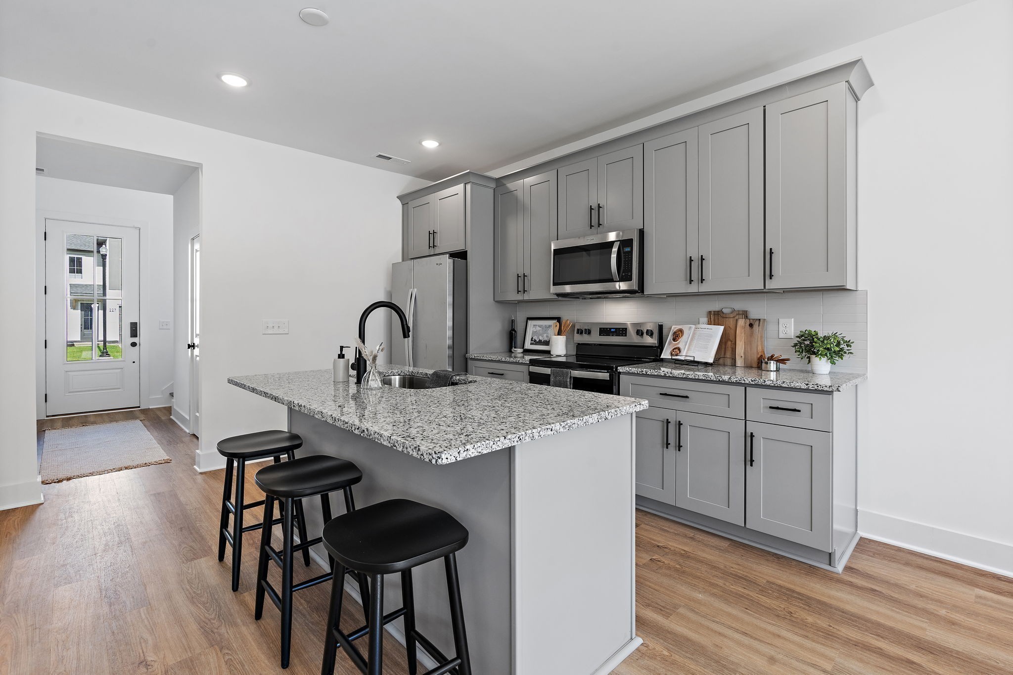 3611 Simba Lane Murfreesboro, TN 37127 - Photo 6 of 30 a kitchen with sink a stove and cabinets