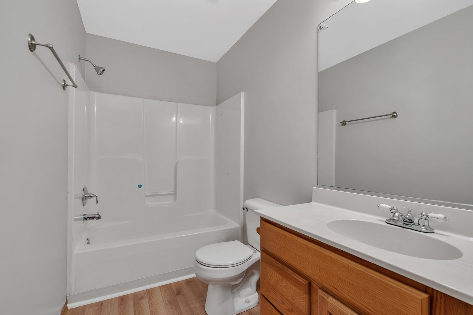 1747 Waters Edge Drive Minooka, IL 60447 - Photo 9 of 11 a bathroom with a sink a toilet and a bathtub