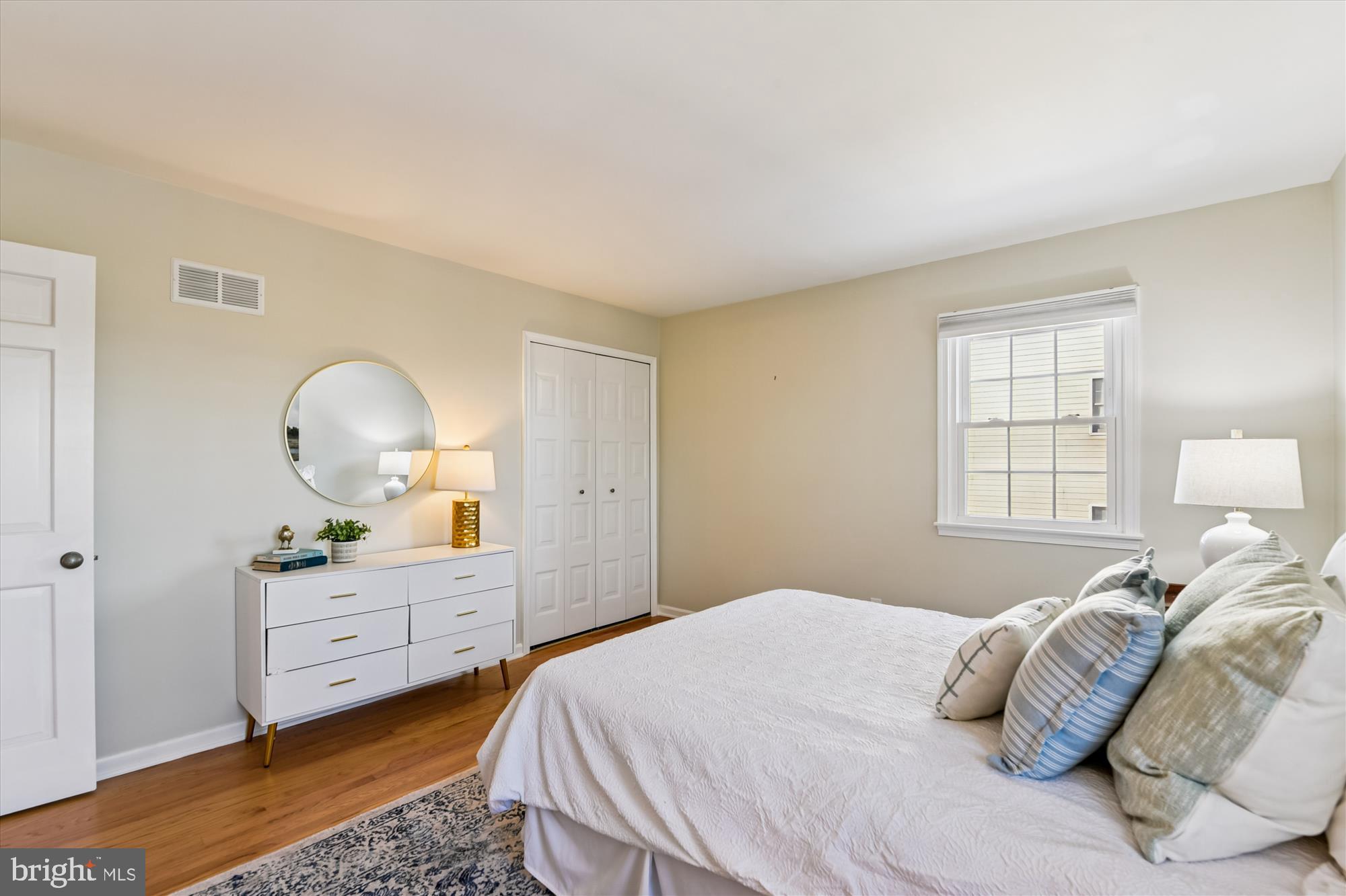 1006 West Joppa Road Towson, MD 21204 - Photo 19 of 47 a bedroom with a bed and a dresser