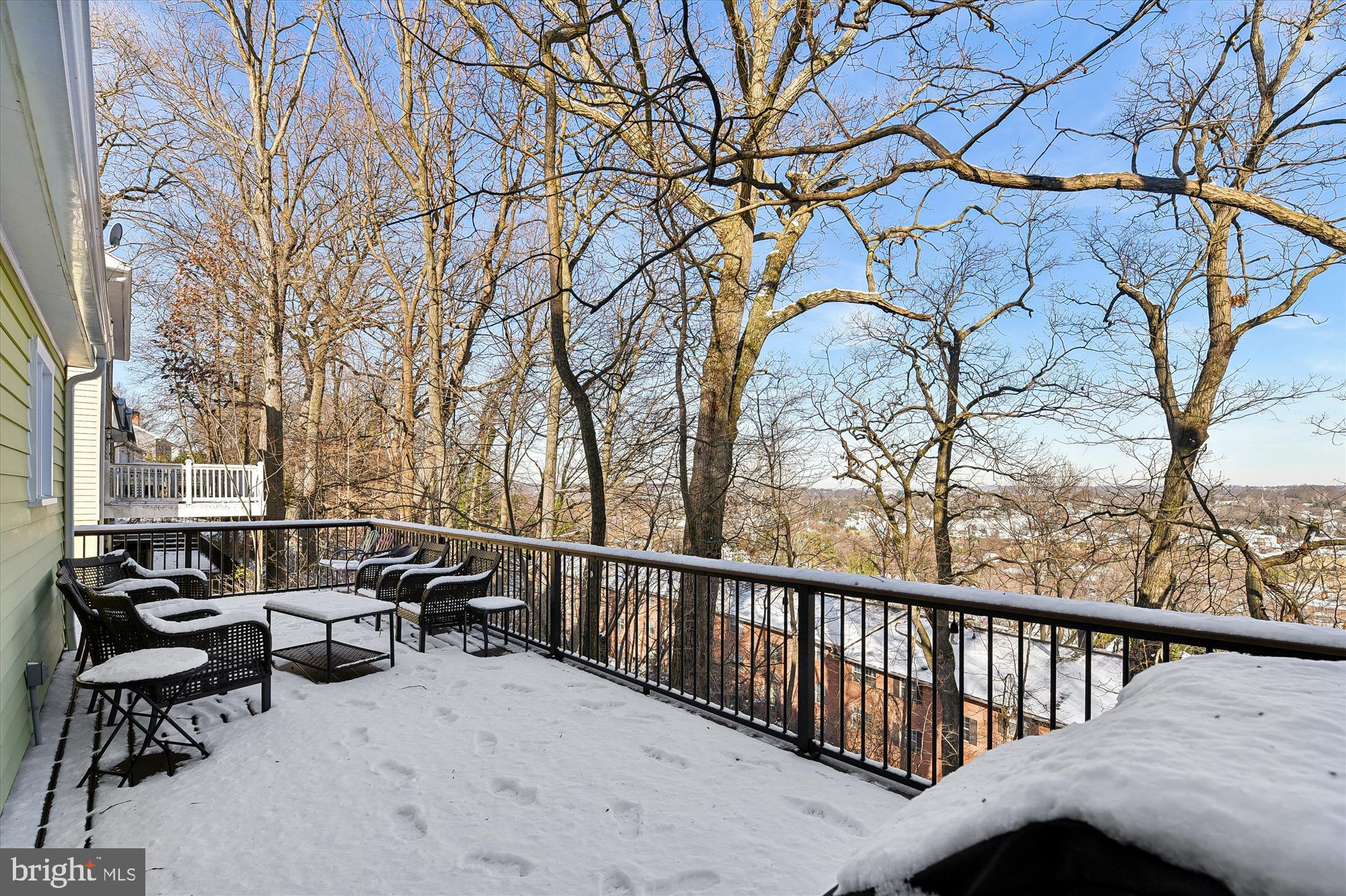 1006 West Joppa Road Towson, MD 21204 - Photo 38 of 47 a view of a balcony with chairs and trees