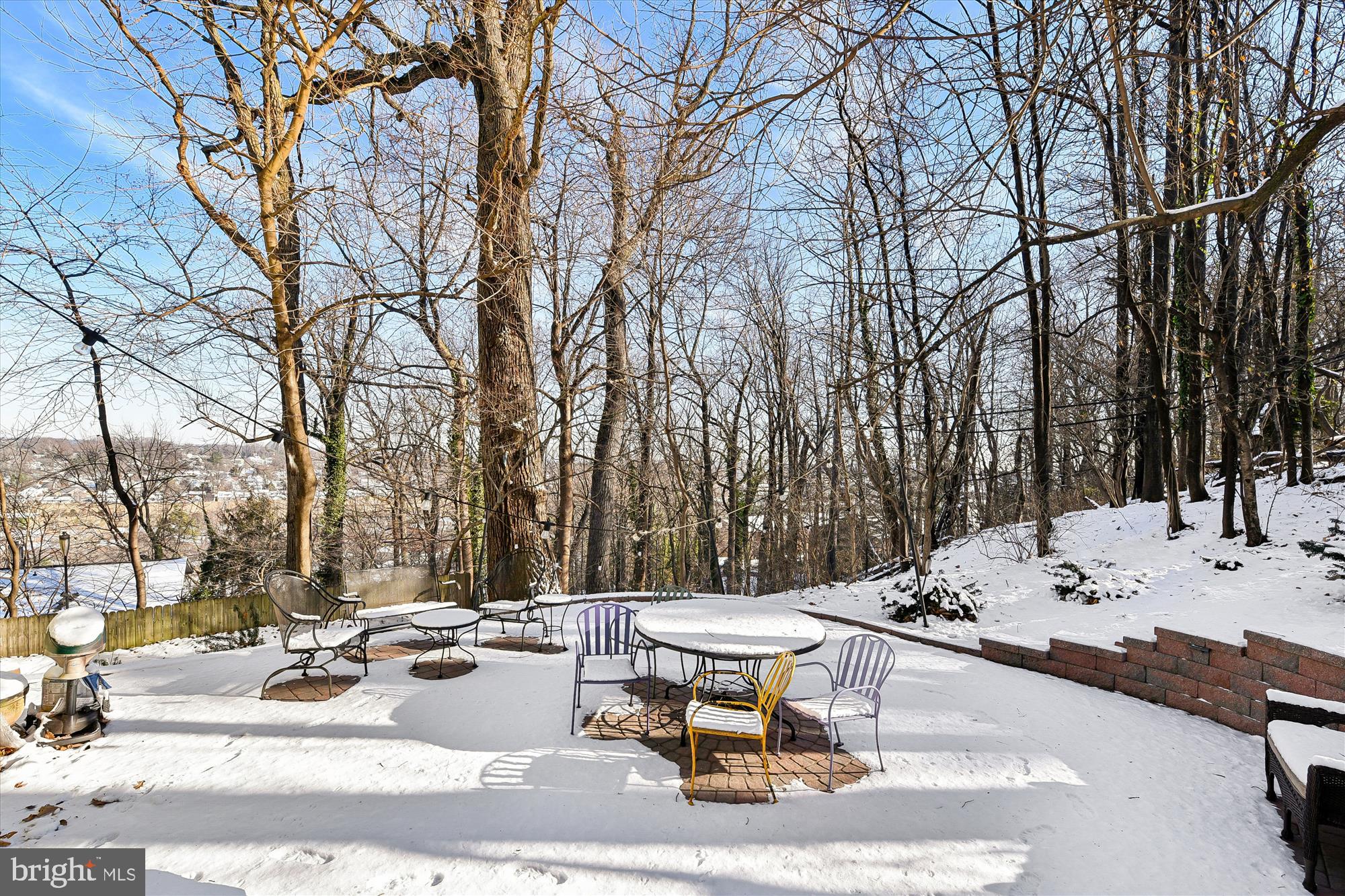 1006 West Joppa Road Towson, MD 21204 - Photo 42 of 47 a view of a backyard with table and chairs