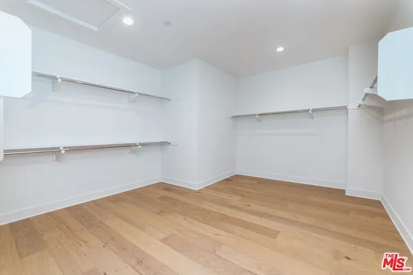 a utility room with cabinets