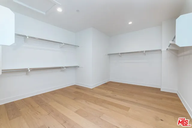 a utility room with cabinets
