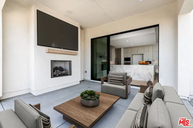 a view of a water fountain and a big yard