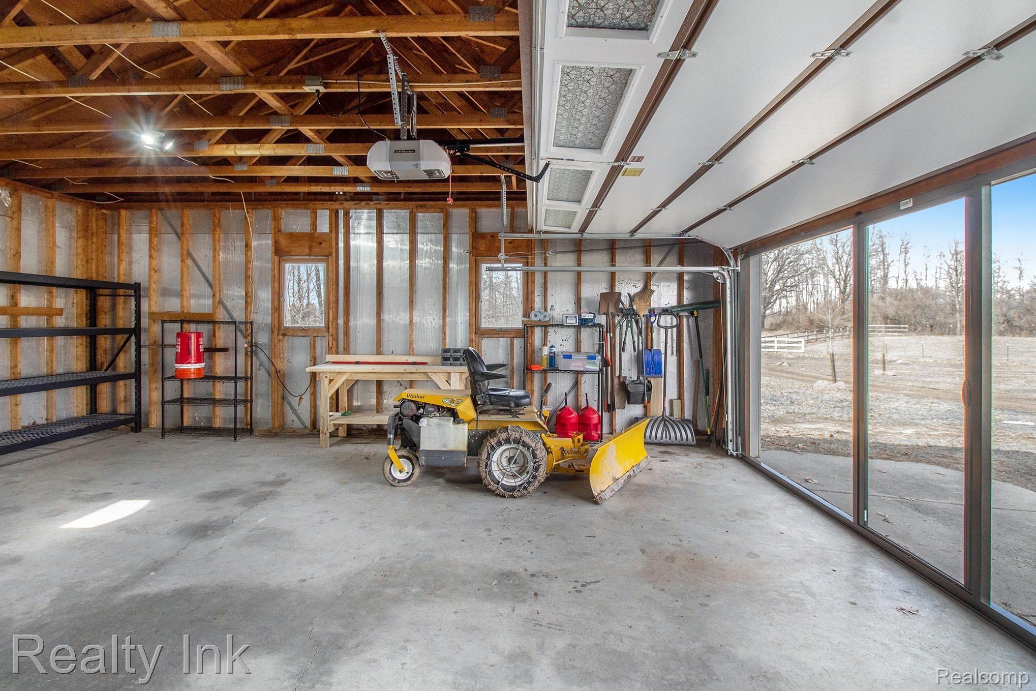 20017 Wasson Road Gregory, MI 48137 - Photo 13 of 26 Overhead garage screen door system