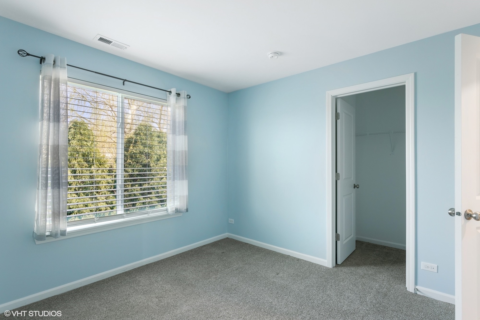 1724 Fredericksburg Lane Aurora, IL 60503 - Photo 14 of 20 a view of an empty room with a window
