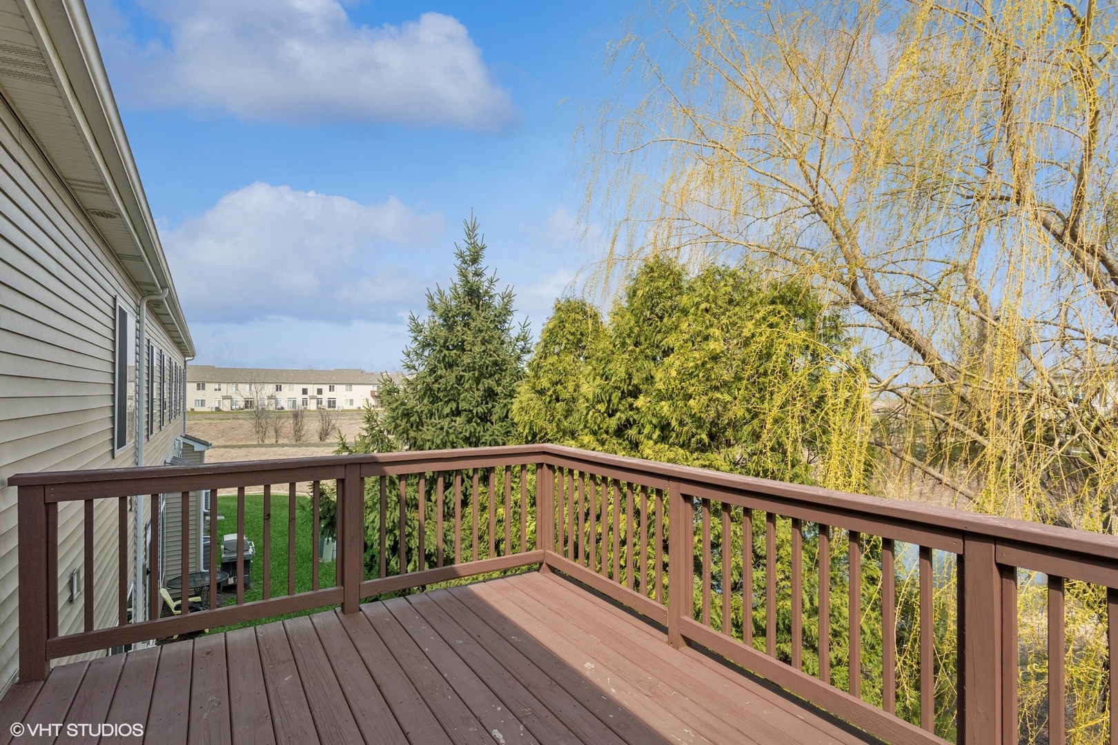 1724 Fredericksburg Lane Aurora, IL 60503 - Photo 17 of 20 a view of a balcony with wooden floor