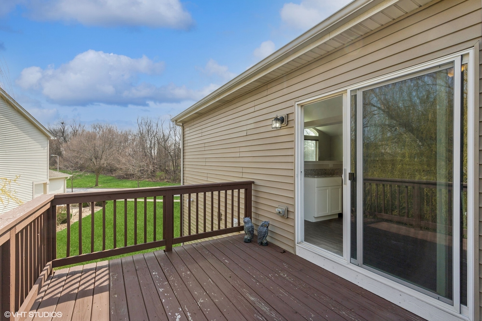 1724 Fredericksburg Lane Aurora, IL 60503 - Photo 18 of 20 a view of a wooden deck