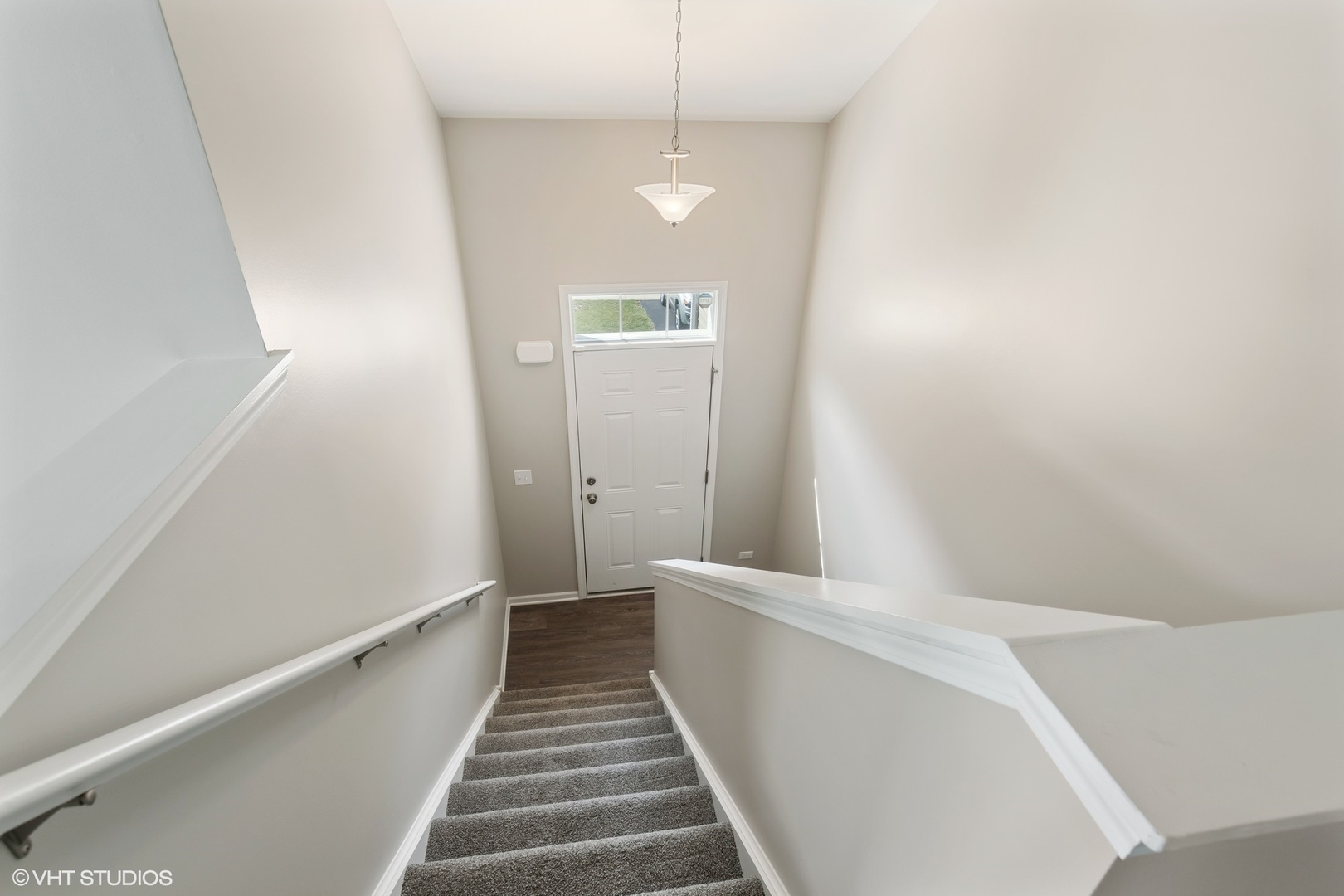 1724 Fredericksburg Lane Aurora, IL 60503 - Photo 3 of 20 a view of a hallway with stairs