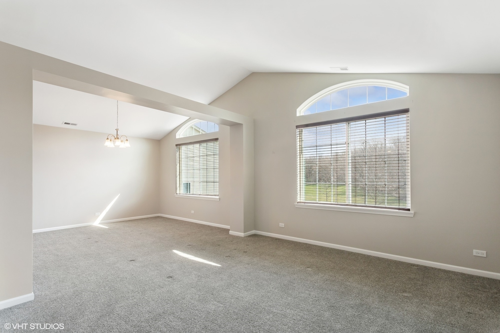 1724 Fredericksburg Lane Aurora, IL 60503 - Photo 4 of 20 an empty room with windows and closet