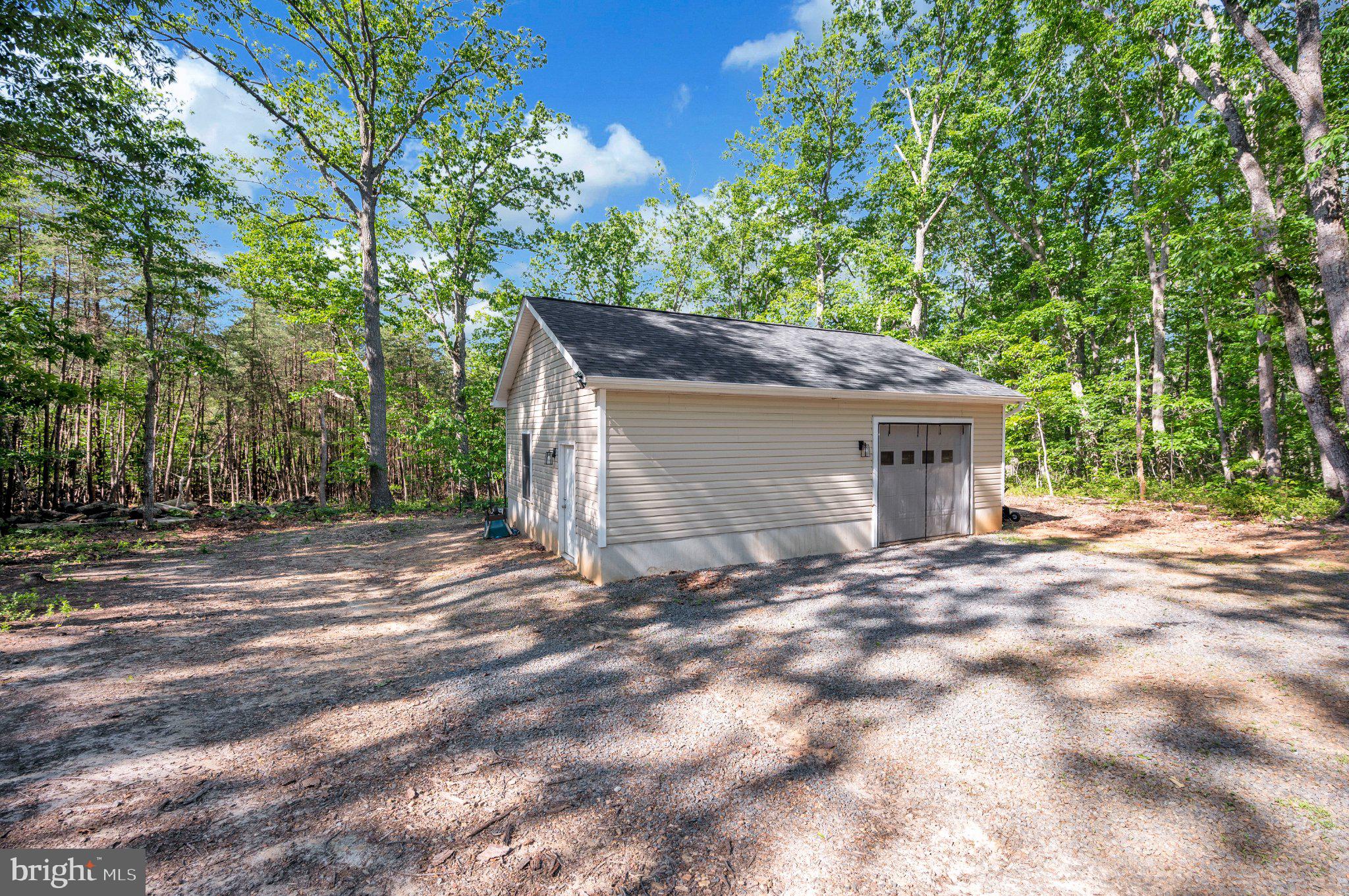 28282 Tatum Road Unionville, VA 22567 - Photo 4 of 52 Charming shed nestled in serene woods.