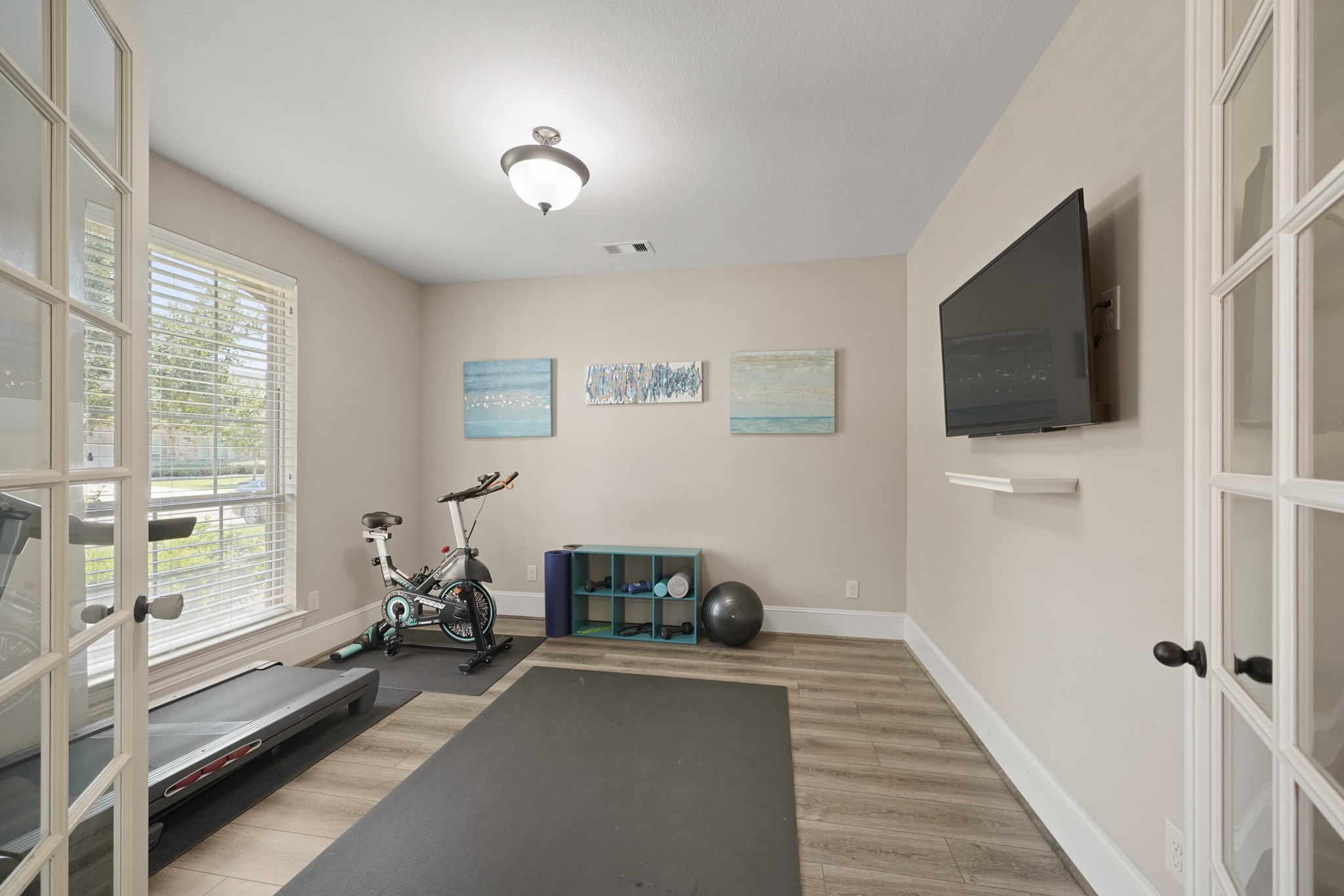 4210 Dalea Clover Lane Manvel, TX 77578 - Photo 18 of 38 a living room with furniture and a flat screen tv