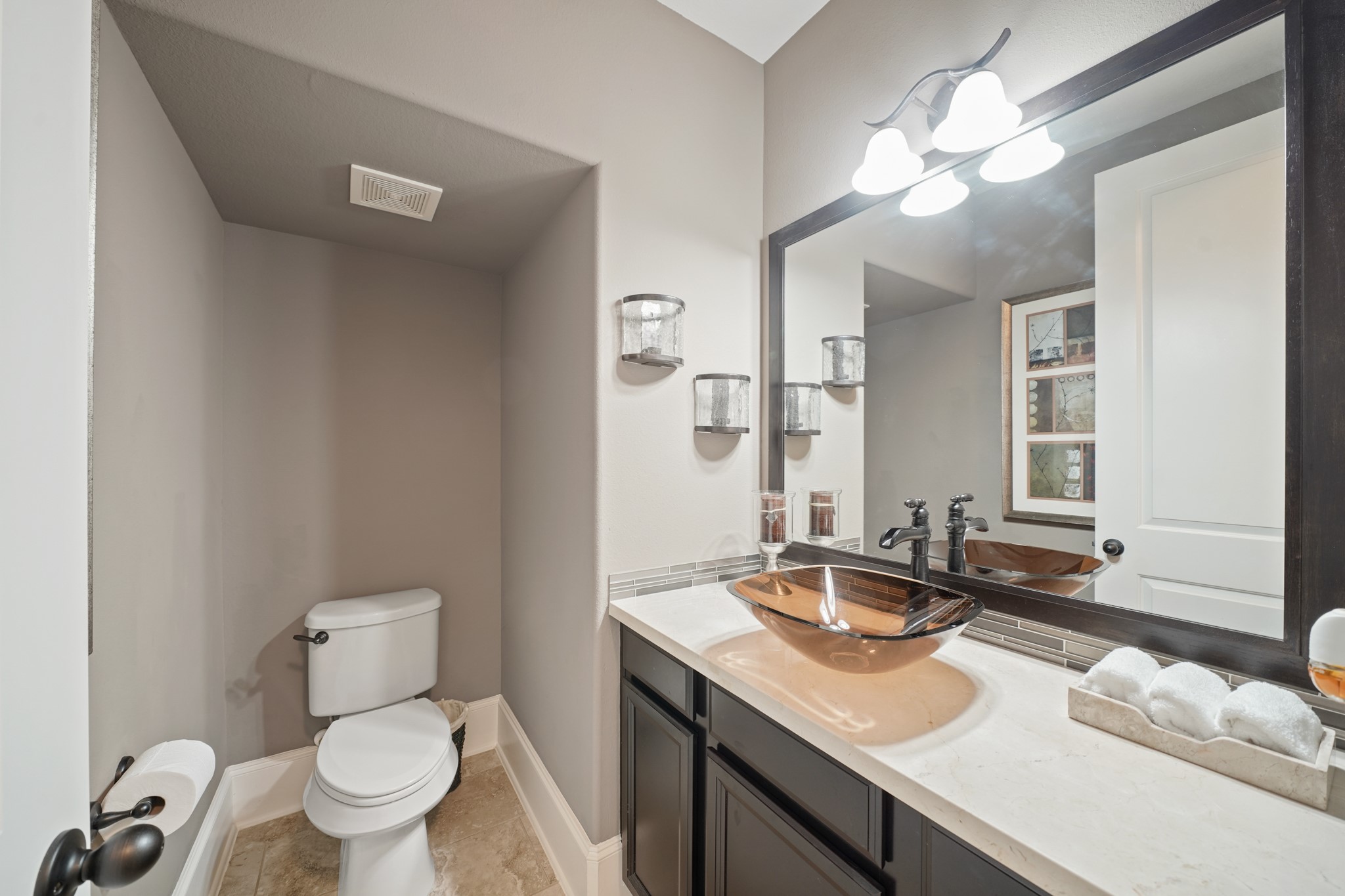 4210 Dalea Clover Lane Manvel, TX 77578 - Photo 20 of 38 a bathroom with a granite countertop sink a toilet and a mirror