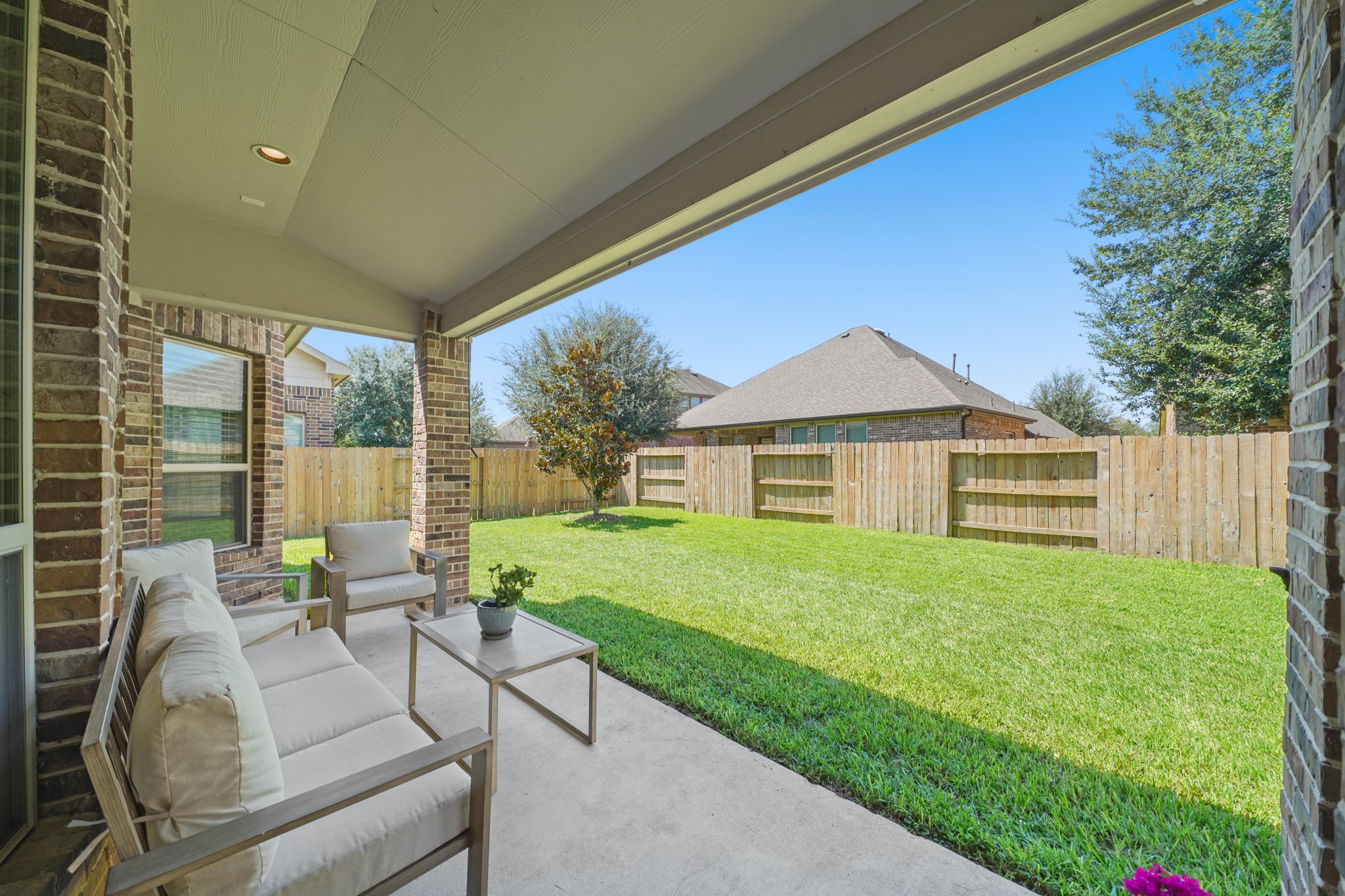 4210 Dalea Clover Lane Manvel, TX 77578 - Photo 30 of 38 a view of house with backyard and outdoor seating