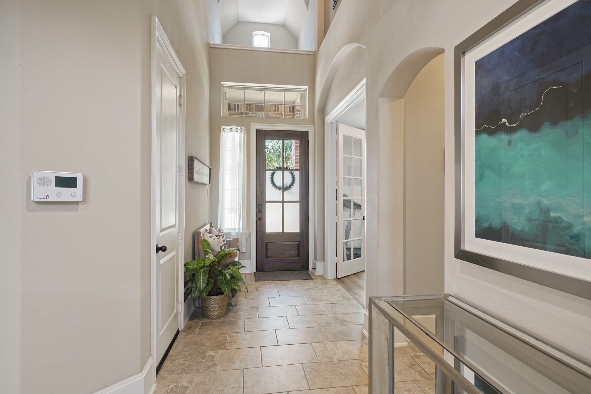 4210 Dalea Clover Lane Manvel, TX 77578 - Photo 4 of 38 a view of a hallway with potted plants
