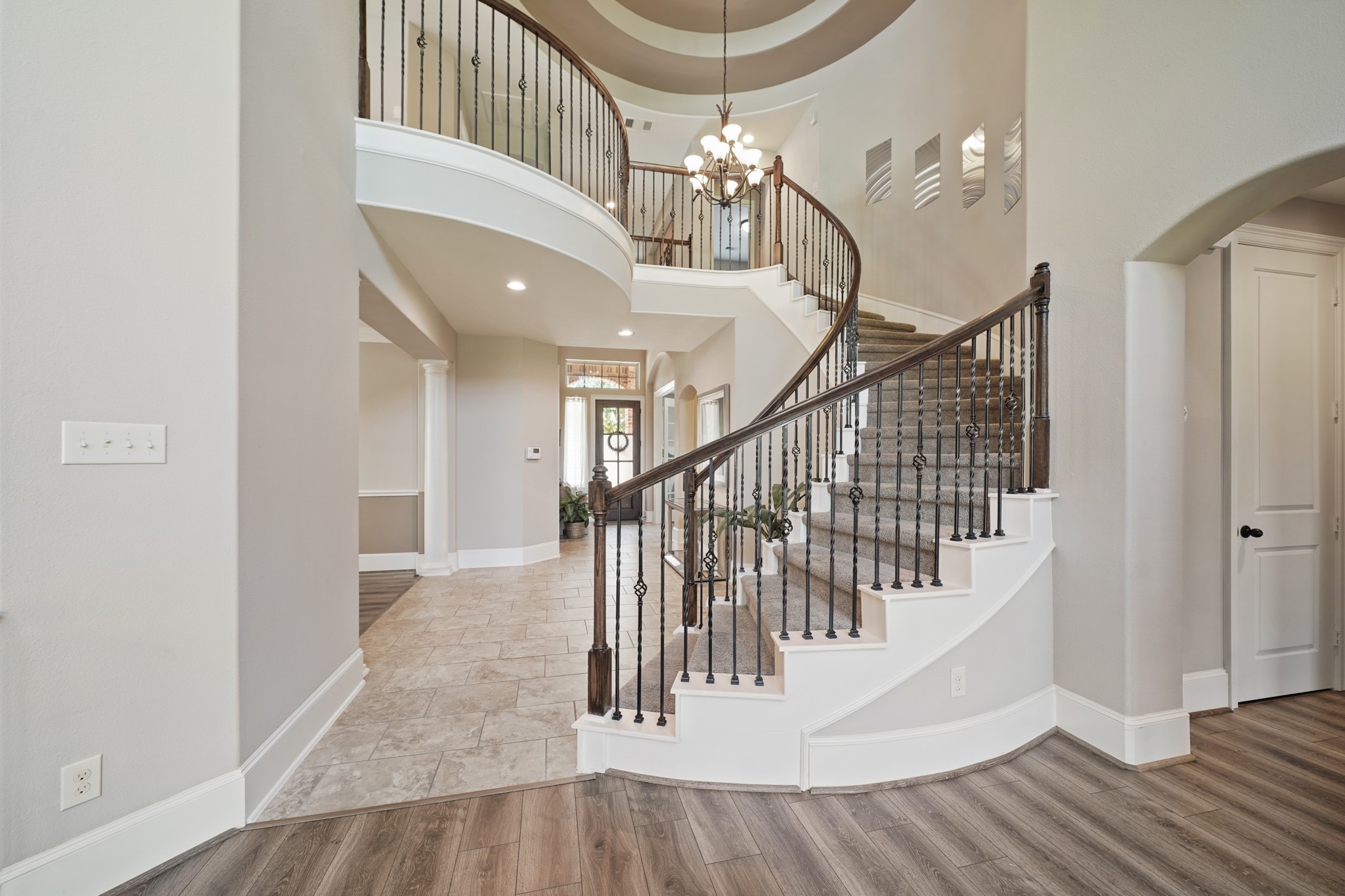 4210 Dalea Clover Lane Manvel, TX 77578 - Photo 5 of 38 a view of entryway and hall with wooden floor