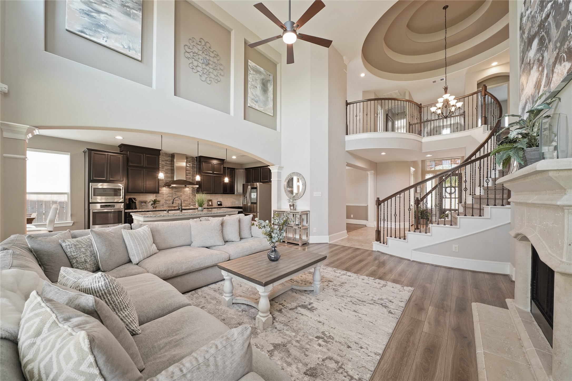4210 Dalea Clover Lane Manvel, TX 77578 - Photo 8 of 38 a living room with furniture and a chandelier