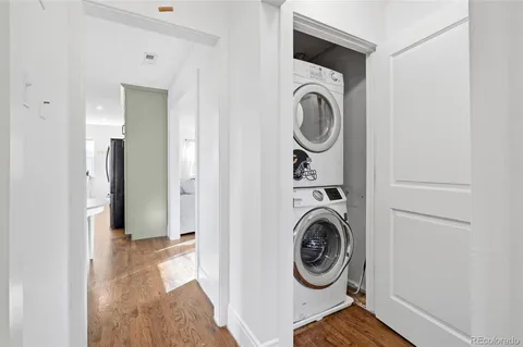 a view of storage and utility room with washer and dryer