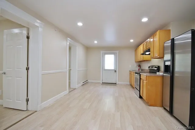 a view of kitchen with windows