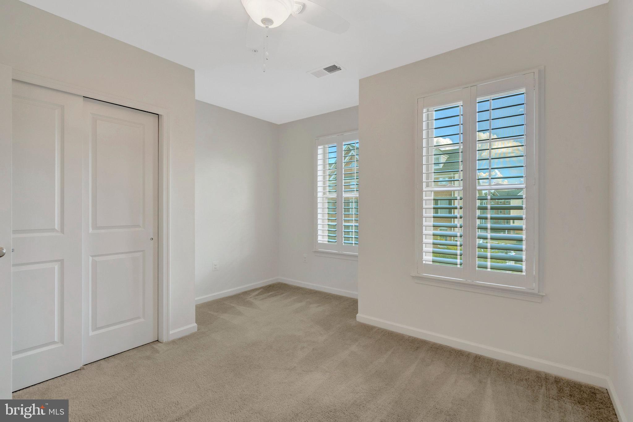 42634 Lancaster Ridge Terrace Chantilly, VA 20152 - Photo 27 of 63 a view of an empty room with a window