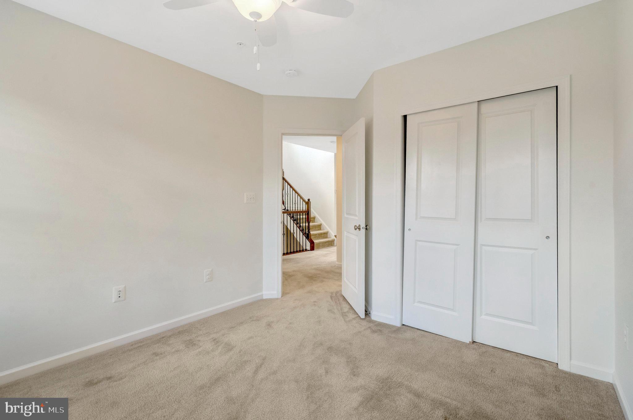 42634 Lancaster Ridge Terrace Chantilly, VA 20152 - Photo 30 of 63 Bedroom with ceiling fan and light