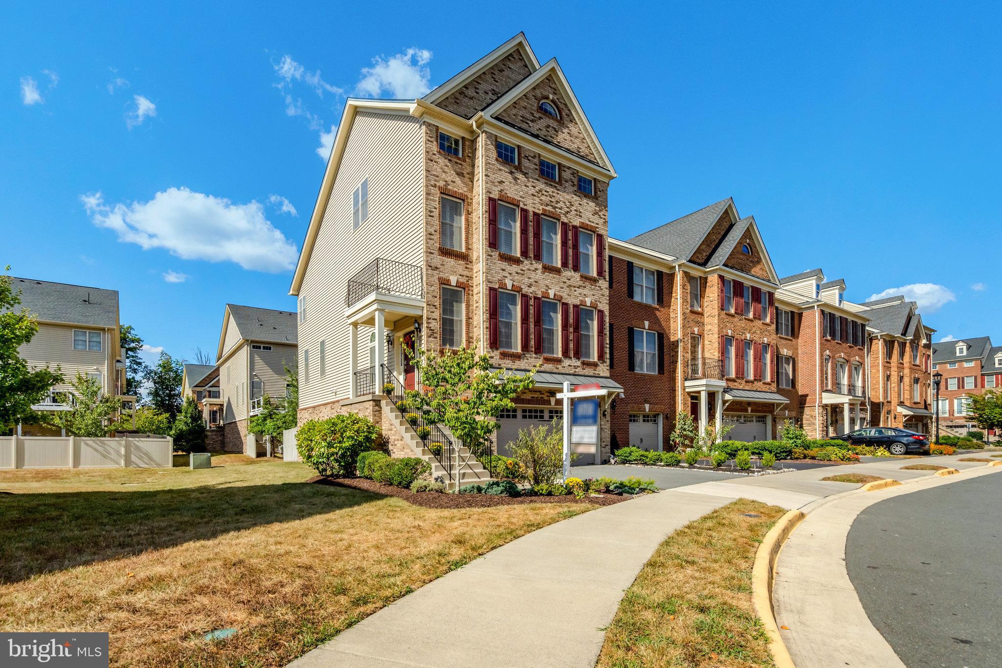 42634 Lancaster Ridge Terrace Chantilly, VA 20152 - Photo 3 of 63 a view of a building with a street