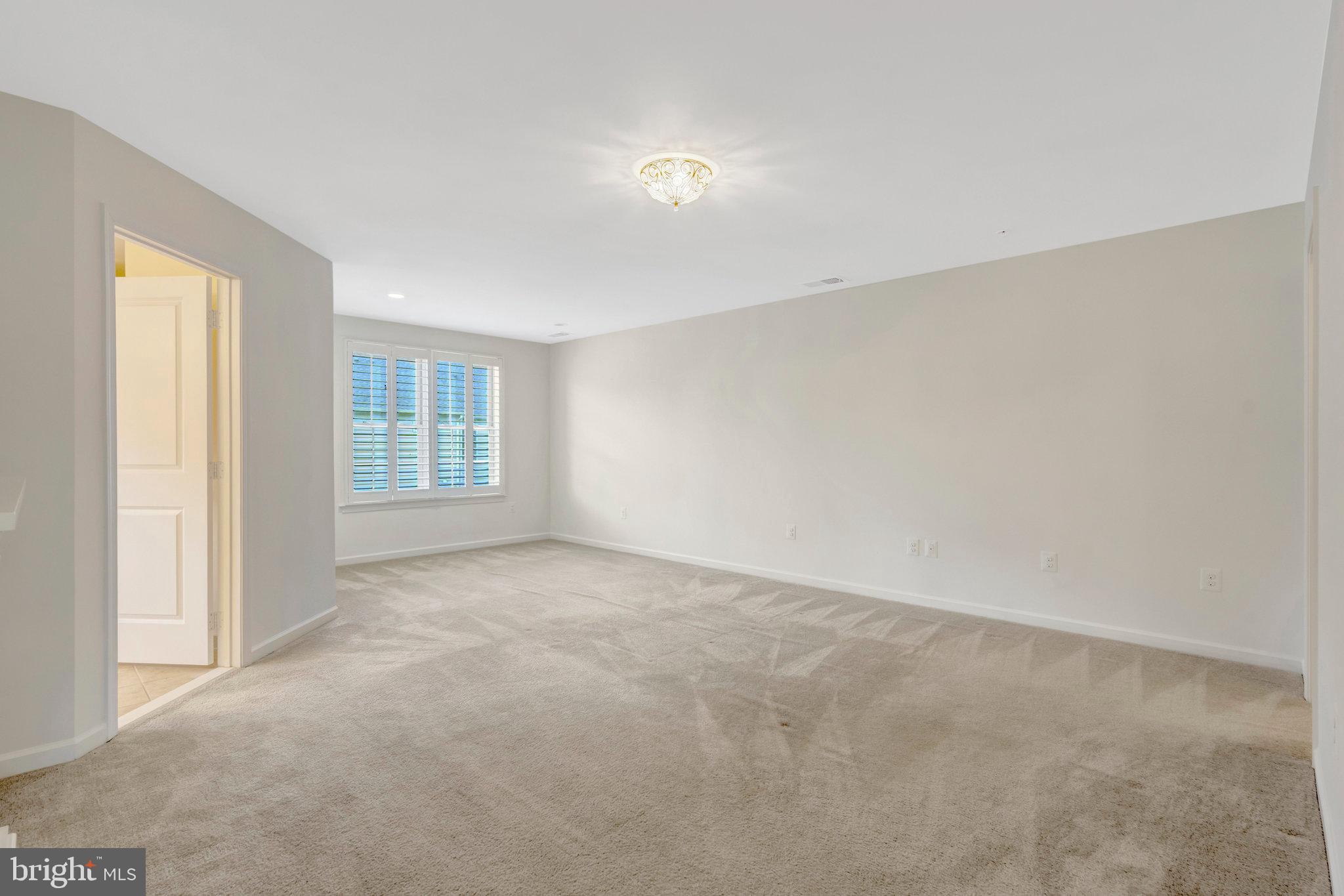42634 Lancaster Ridge Terrace Chantilly, VA 20152 - Photo 34 of 63 a view of an empty room with a window