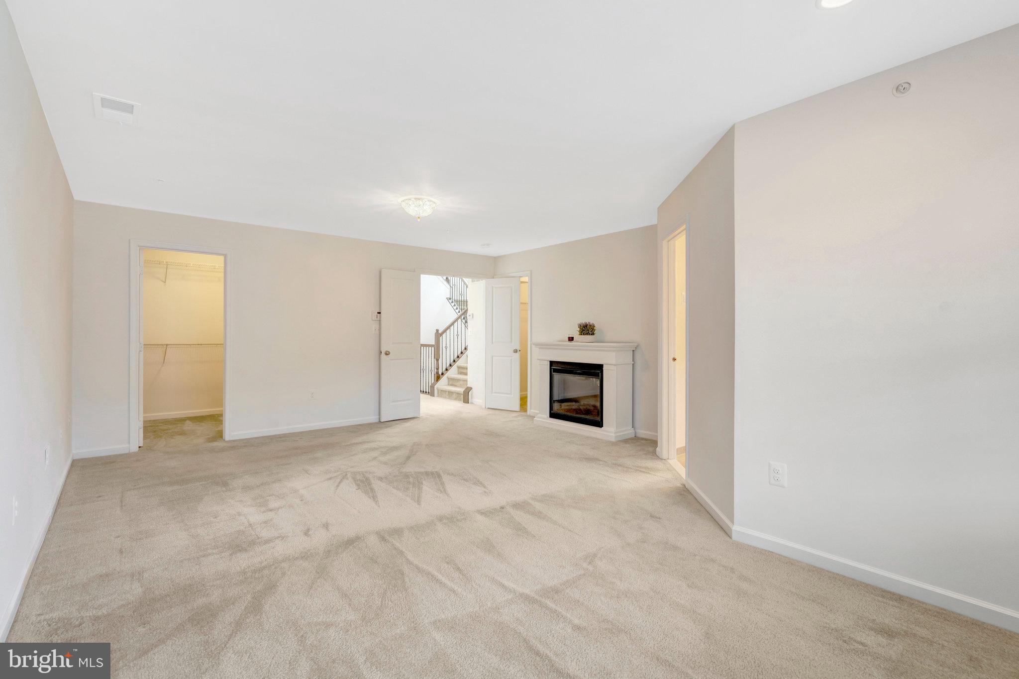 42634 Lancaster Ridge Terrace Chantilly, VA 20152 - Photo 36 of 63 an empty room with fireplace