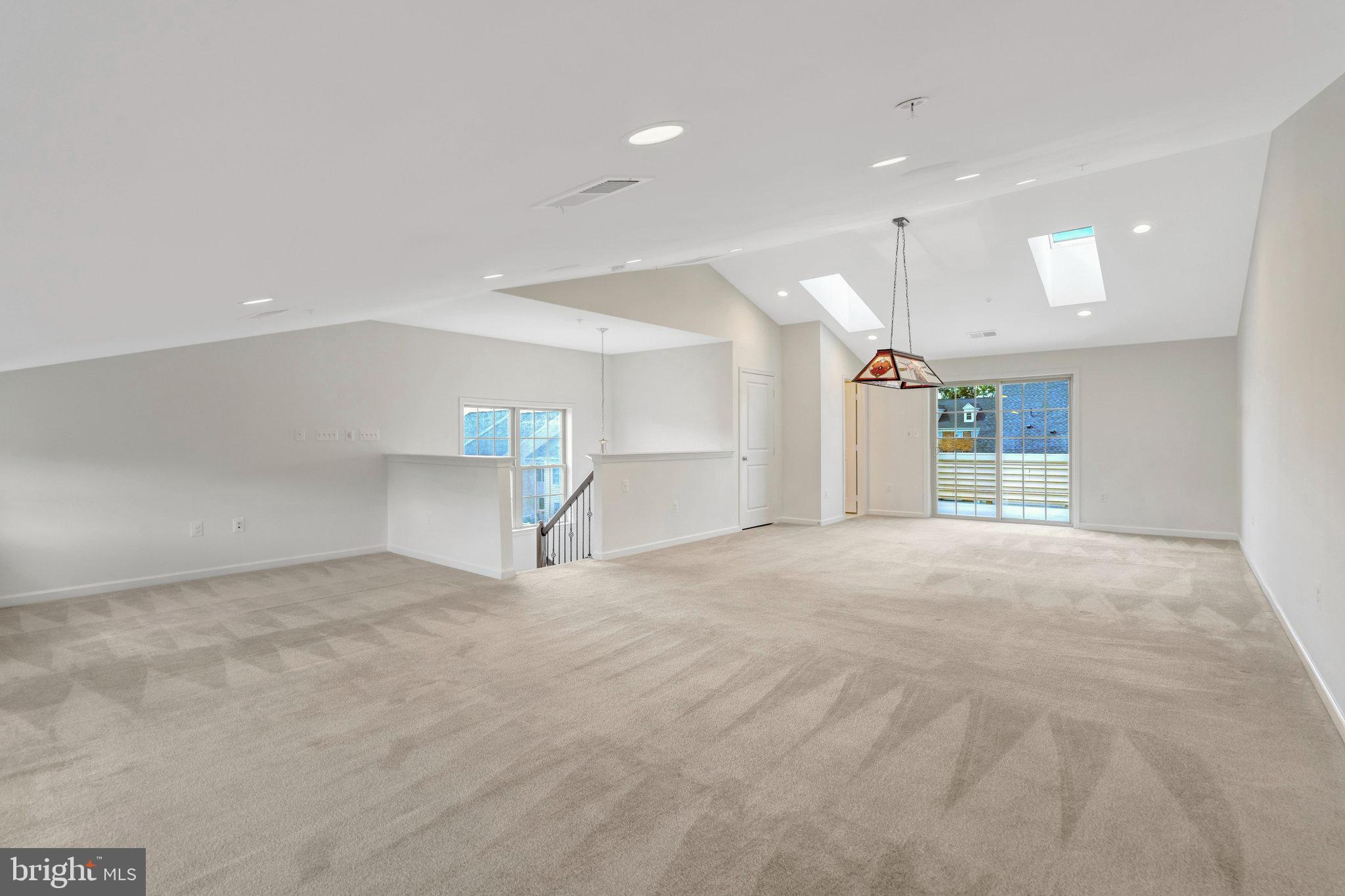 42634 Lancaster Ridge Terrace Chantilly, VA 20152 - Photo 42 of 63 a view of empty room with kitchen and window