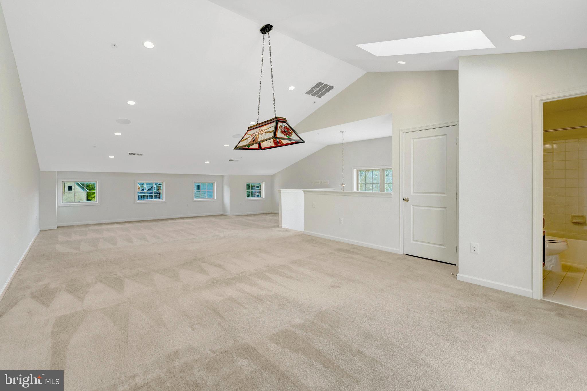 42634 Lancaster Ridge Terrace Chantilly, VA 20152 - Photo 45 of 63 a view of a hallway with a room and a window