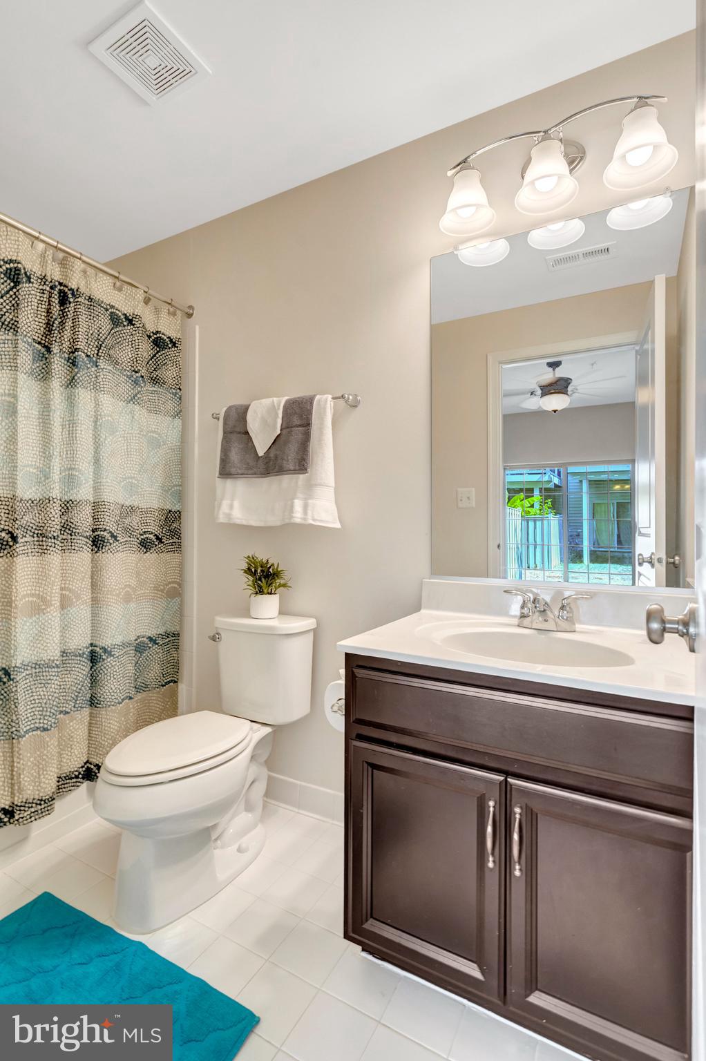 42634 Lancaster Ridge Terrace Chantilly, VA 20152 - Photo 54 of 63 a bathroom with a sink a toilet and shower