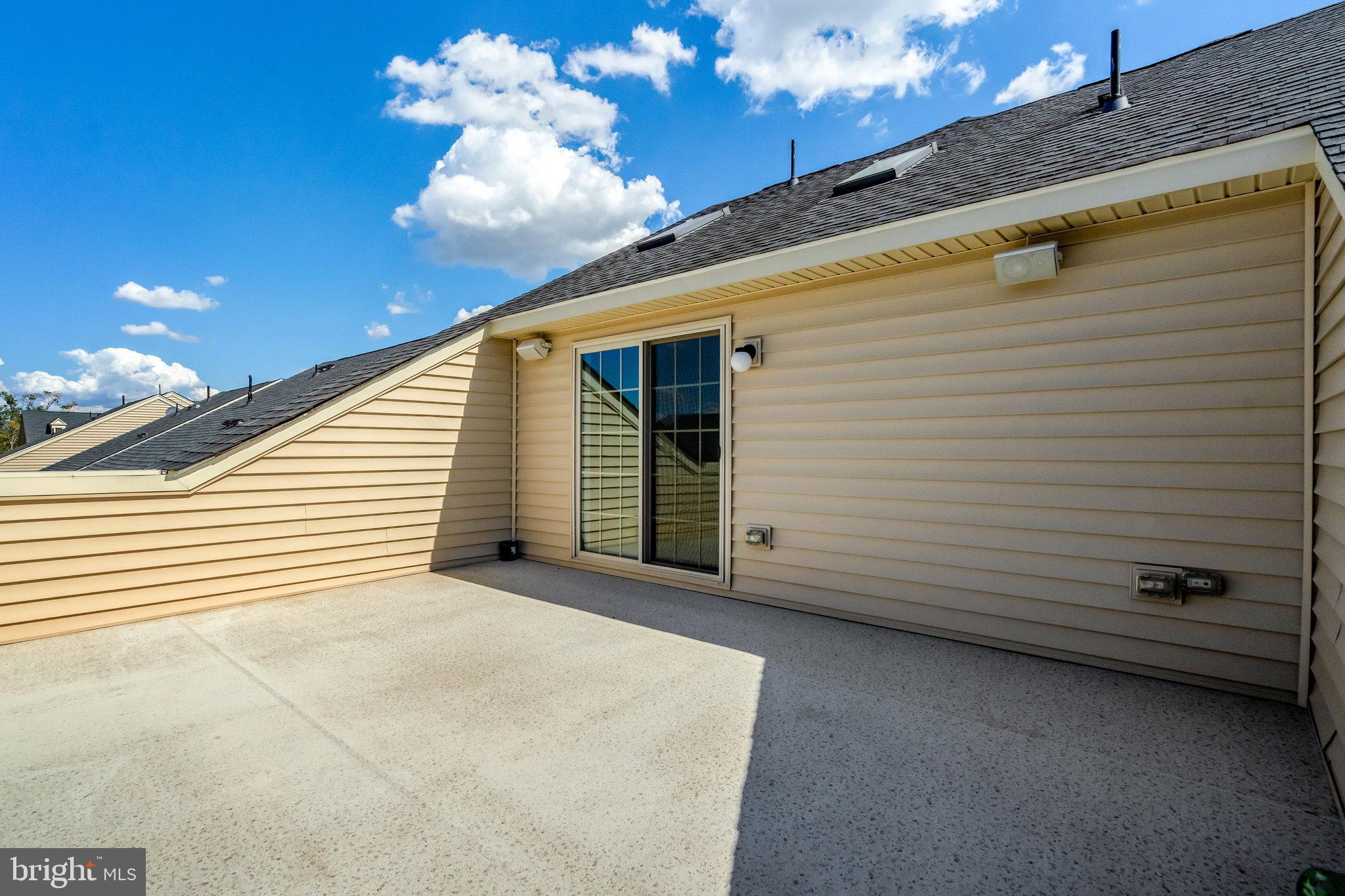 42634 Lancaster Ridge Terrace Chantilly, VA 20152 - Photo 58 of 63 Sliding glass doors opens up to a stunning terrace