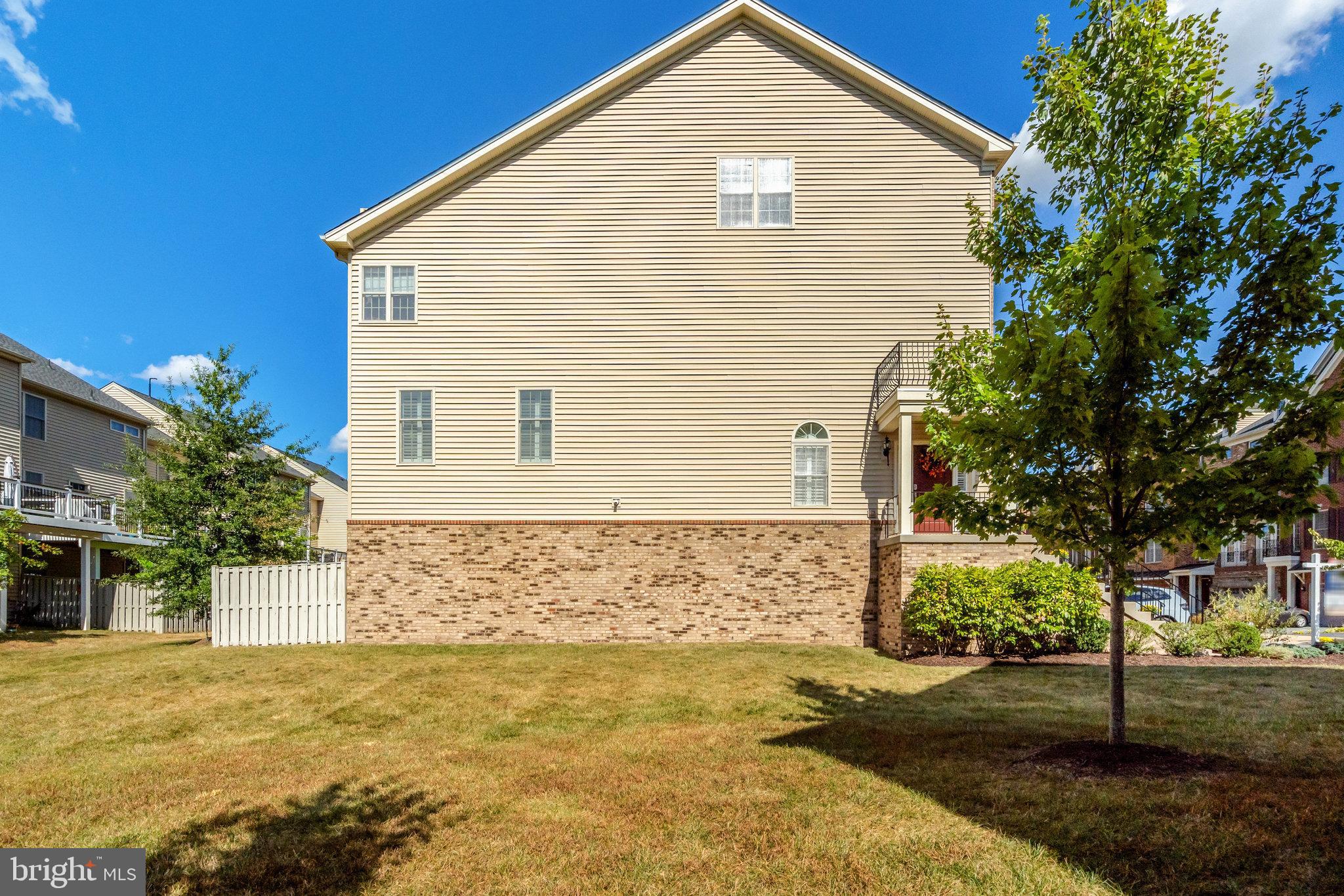 42634 Lancaster Ridge Terrace Chantilly, VA 20152 - Photo 61 of 63 a view of a backyard of the house