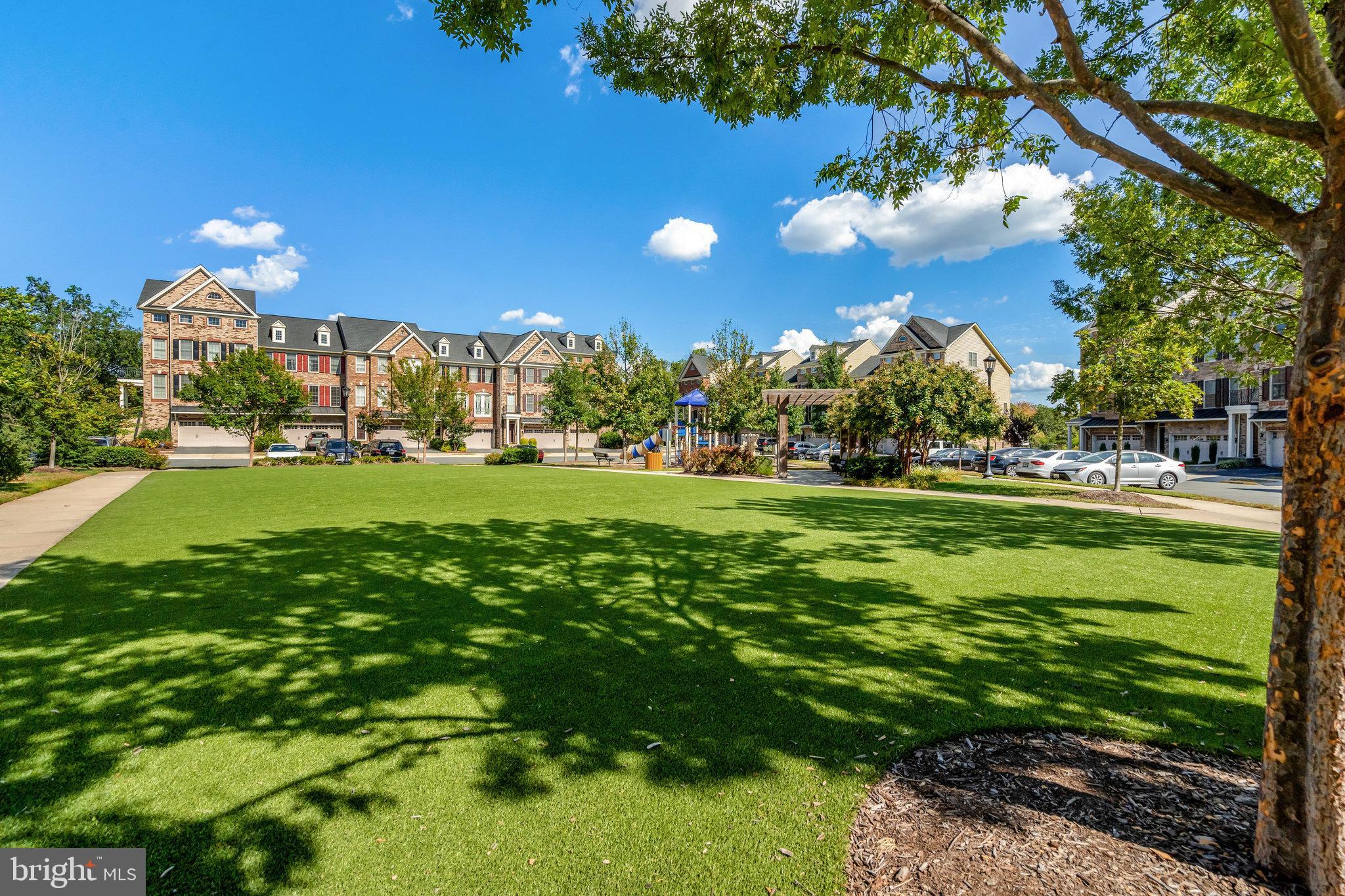 42634 Lancaster Ridge Terrace Chantilly, VA 20152 - Photo 62 of 63 a view of a golf course with a house