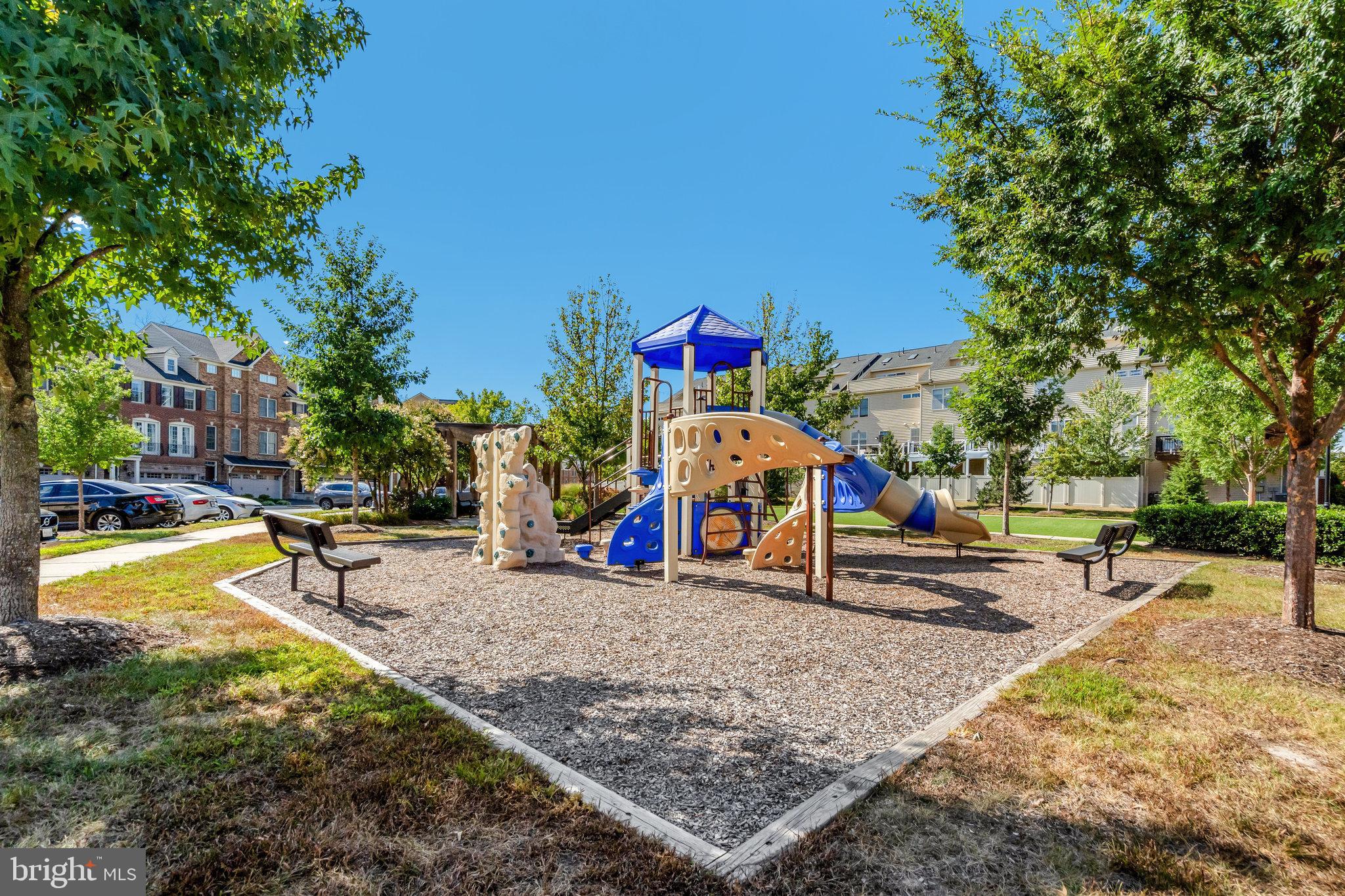 42634 Lancaster Ridge Terrace Chantilly, VA 20152 - Photo 63 of 63 a view of a park with swings and slides