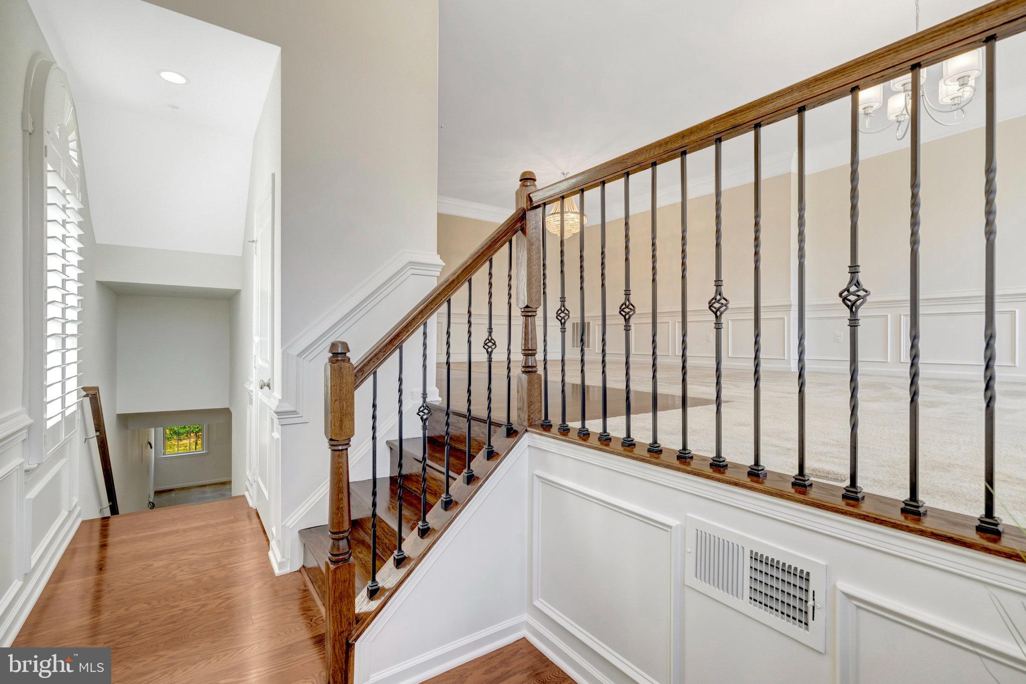 42634 Lancaster Ridge Terrace Chantilly, VA 20152 - Photo 7 of 63 a view of staircase with railing and white walls