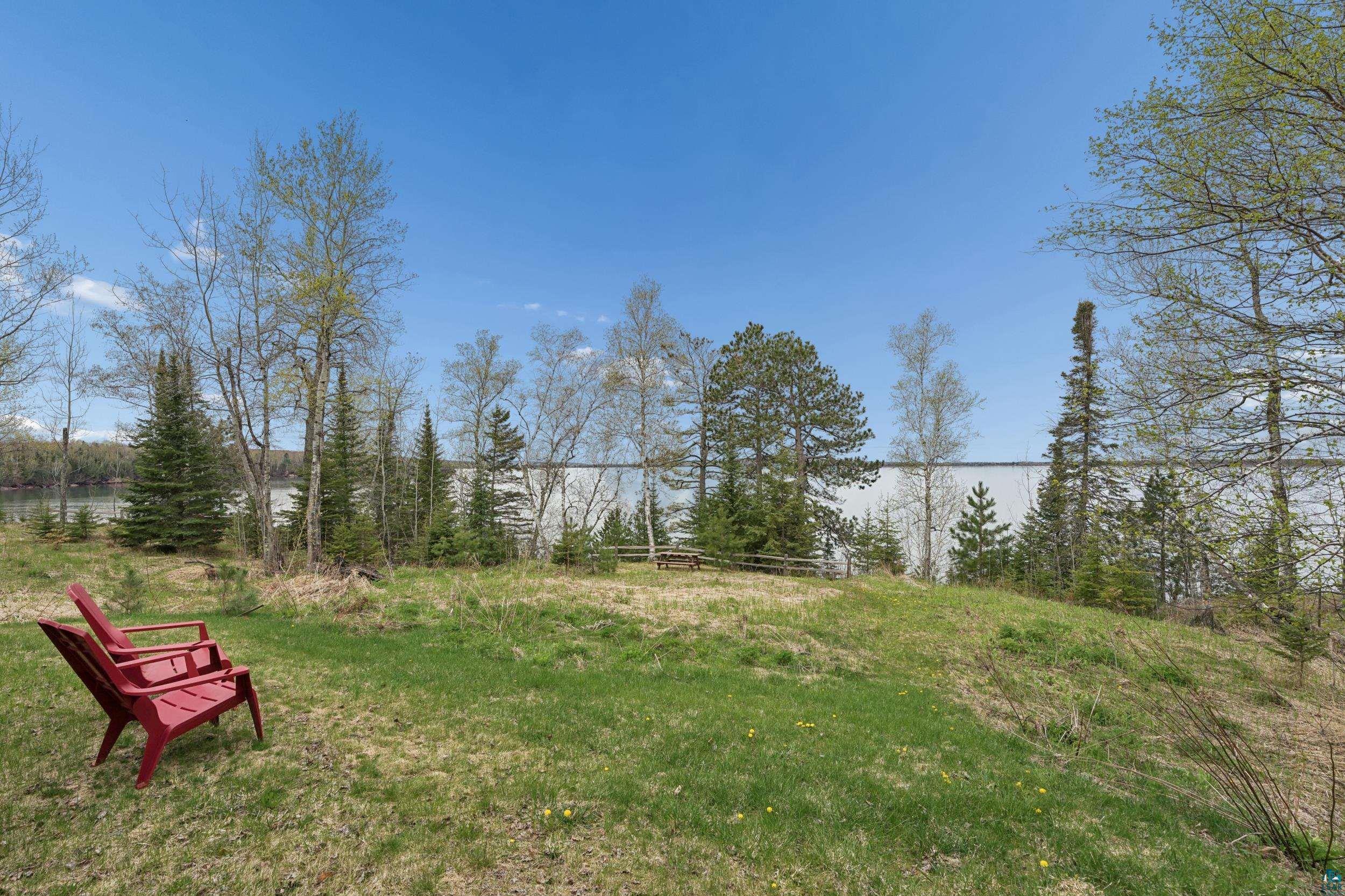 89095 West Romans Point Road Herbster, WI 54844 - Photo 27 of 30 Expansive grassy yard with a gentle slope