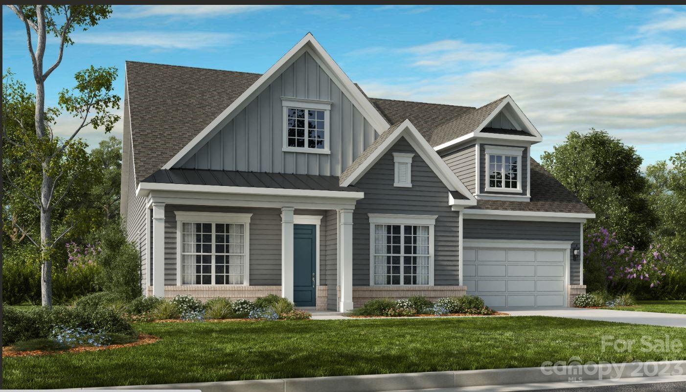 4146 Charlton Road, Unit 211 Fort Mill, SC 29715 - Photo 1 of 1 a front view of a house with garden