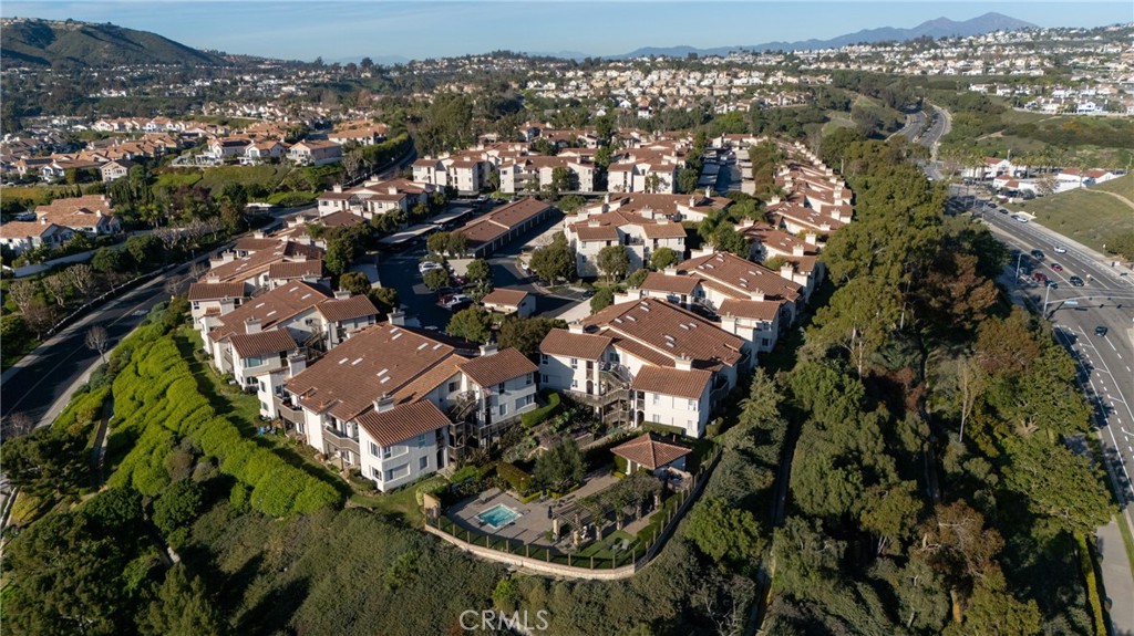 72 Corniche Drive, Unit E Dana Point, CA 92629 - Photo 37 of 61 an aerial view of residential building with parking space