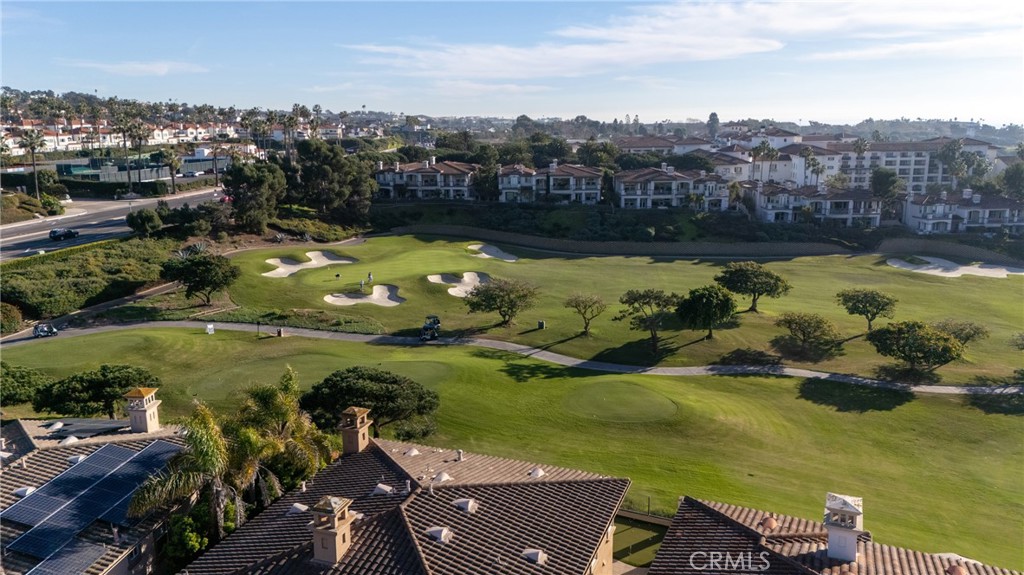 72 Corniche Drive, Unit E Dana Point, CA 92629 - Photo 48 of 61 a view of a city with lawn chairs