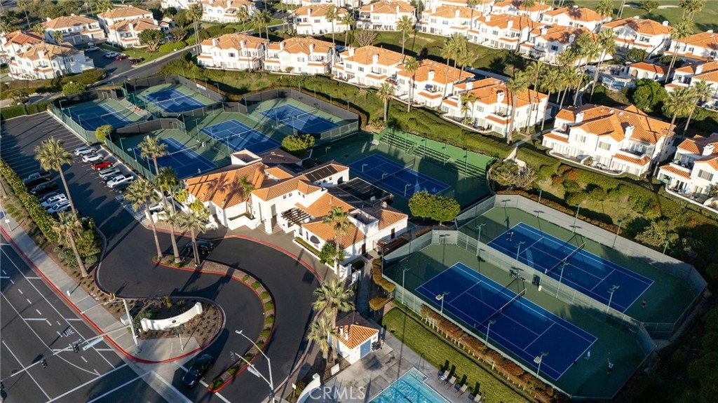 72 Corniche Drive, Unit E Dana Point, CA 92629 - Photo 59 of 61 a view of a chairs and table in a patio