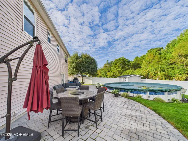 a view of a chairs setting on the roof deck