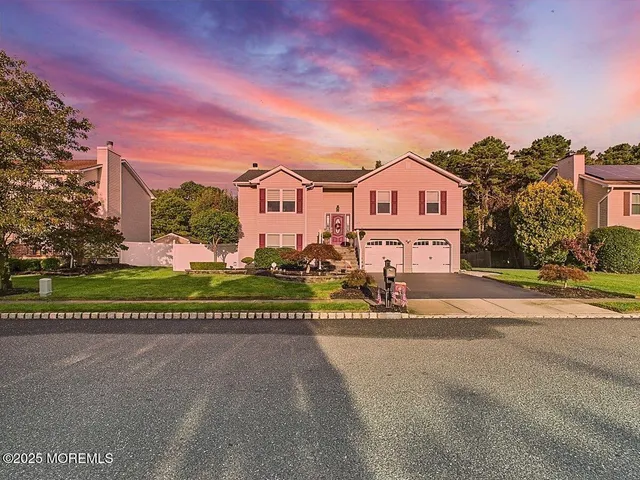 a view of outdoor space with seating area and trees