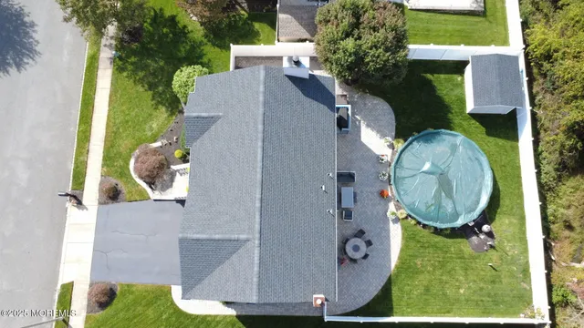 a view of a outdoor space with a table and chairs